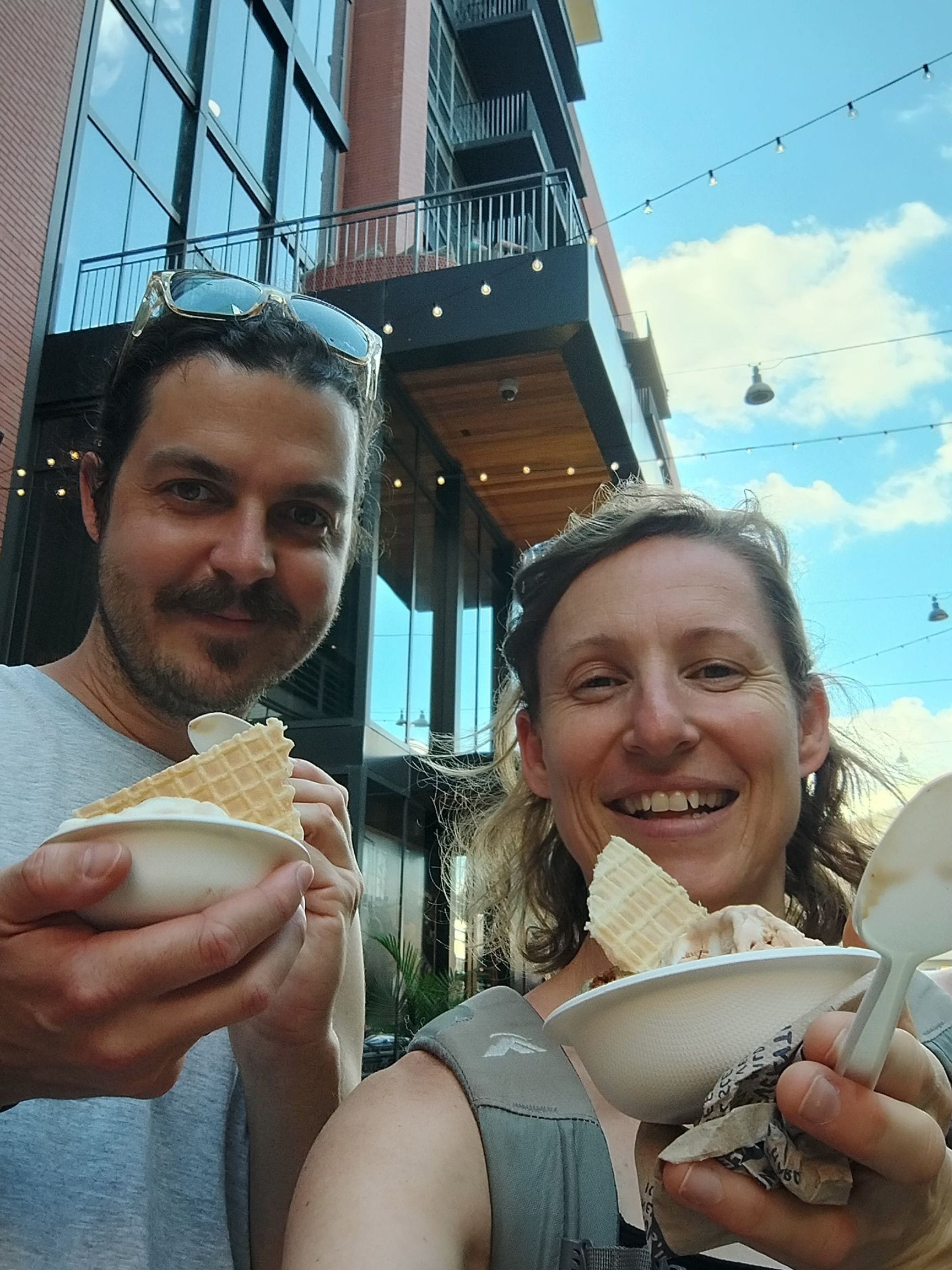 A selfie of a male and female in Nashville eating icecream