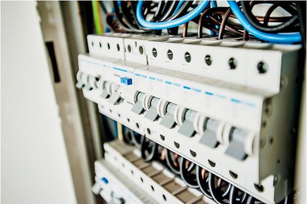up close photo of circuit breakers in a switchboard